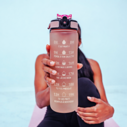 Bouteille de motivation hydratation rose